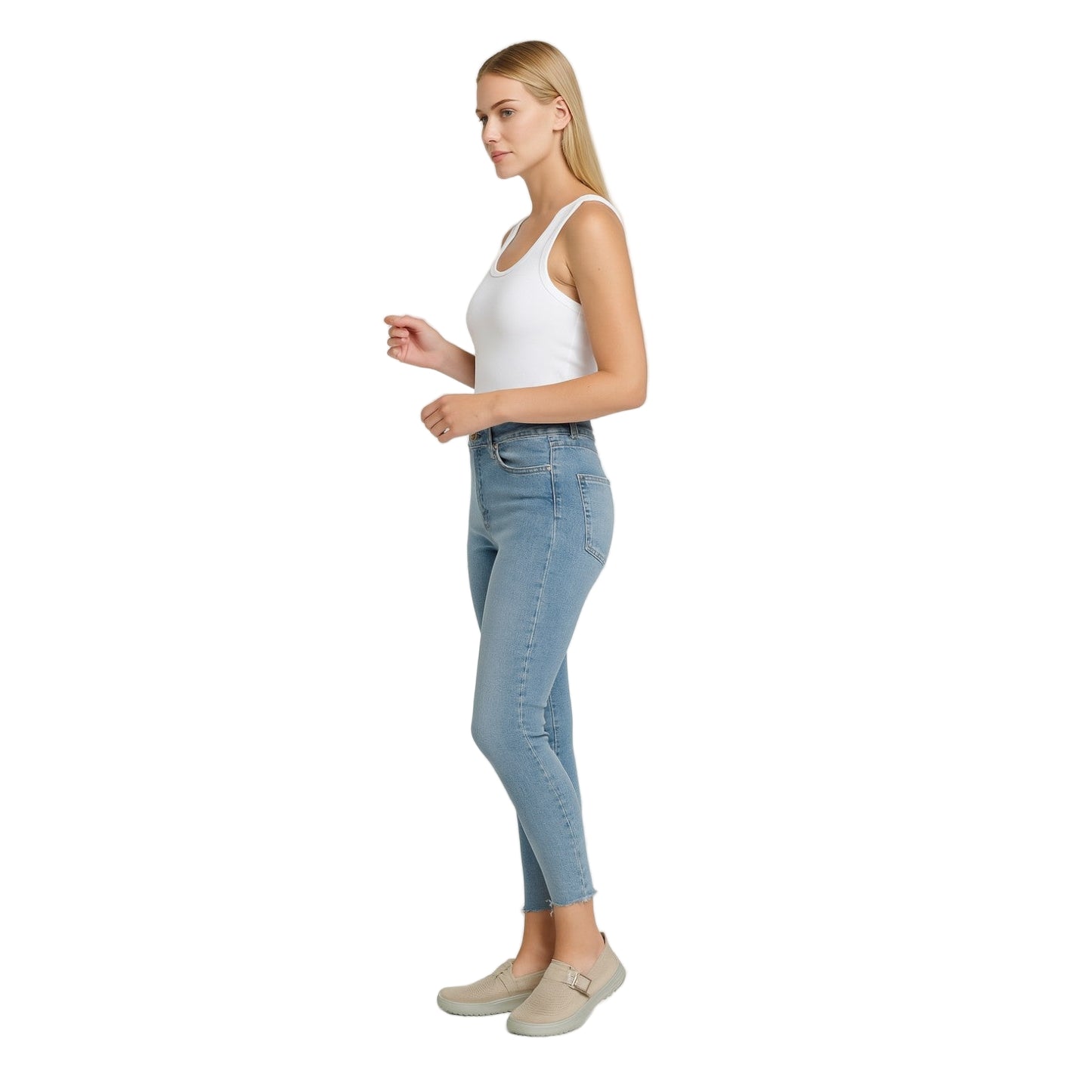 Woman wearing light blue jeans and a white top on a white background