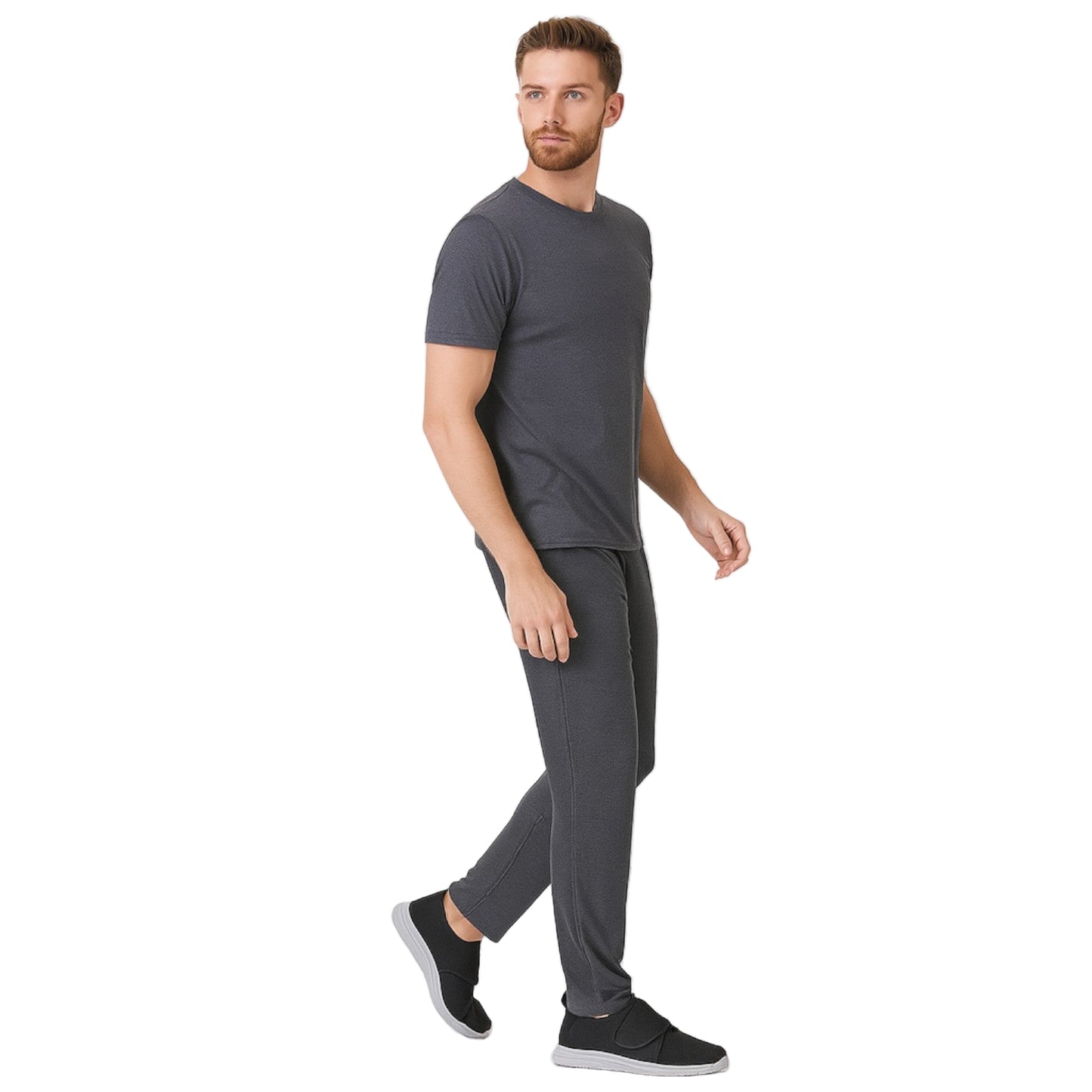 Man wearing a gray t-shirt and pants on a white background