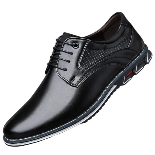 Black leather dress shoe on a white background